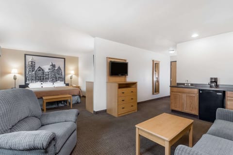 Suite, 1 King Bed, Refrigerator | In-room safe, individually decorated, individually furnished, desk
