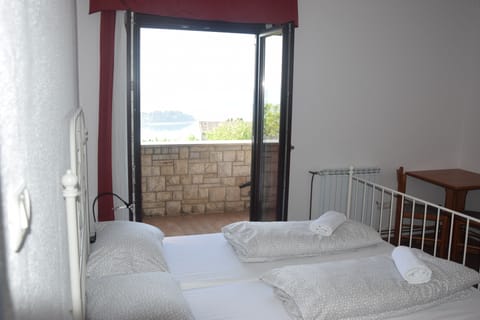 Quadruple Room, Shared Bathroom | Free WiFi, bed sheets