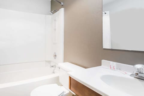 Combined shower/tub, deep soaking tub, free toiletries, hair dryer