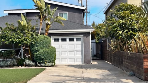 Use Driveway to Enter the Black Gate to your Guest House
