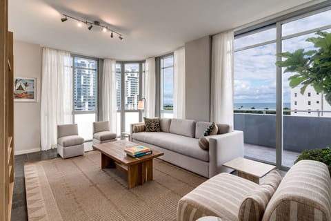 Three Bedroom Penthouse with Rooftop Terrace | Living area | 42-inch flat-screen TV with satellite channels, TV, iPod dock
