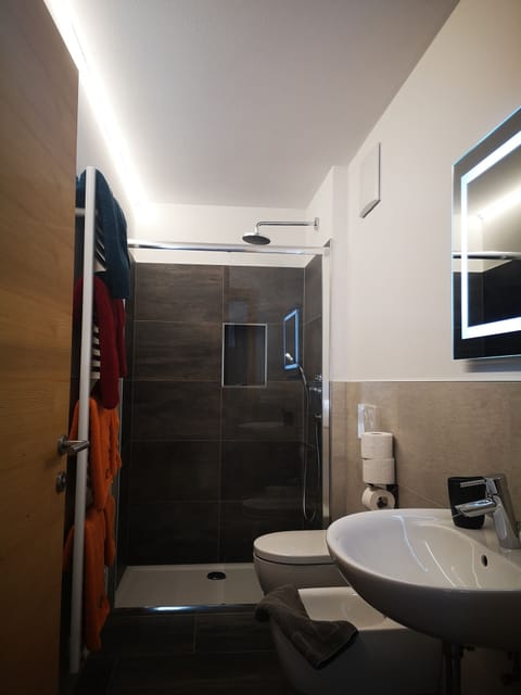 Apartment, Balcony | Bathroom | Shower, hair dryer, bidet, heated floors