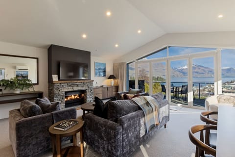 Two Bedroom Apartment | Living area | 45-cm flat-screen TV with cable channels, TV, fireplace