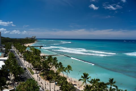 Beach nearby, white sand, beach towels