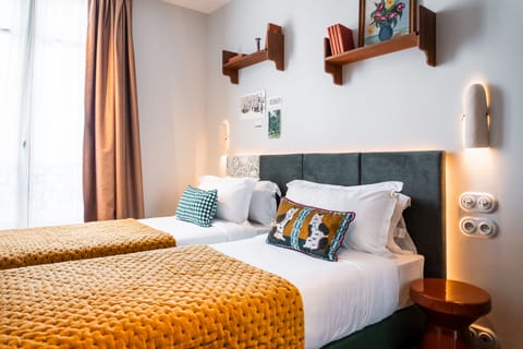 Medium Twin | Premium bedding, in-room safe, desk, blackout drapes