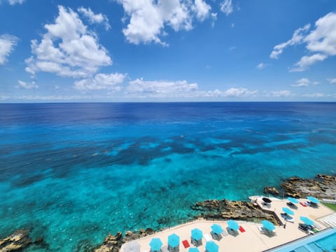 Beach nearby, white sand, sun loungers, beach umbrellas