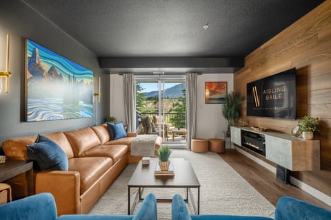 The whole suite was completely redone in June 2026; the living area now features a all new everything, including a 58` Smart TV with cable, electric fireplace, walkout access to the private, third-floor balcony and cozy seating options, including a queen