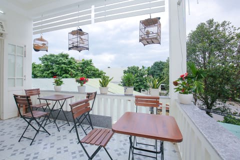 Standard Triple Room, City View | Terrace/patio
