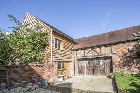 Apartment to the left and the courtyard in front of it.