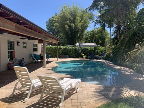 Heated pool with plenty of seating to enjoy the sun ☀️ 