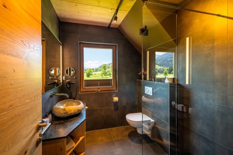 Chalet | Bathroom | Designer toiletries, hair dryer, bathrobes, slippers