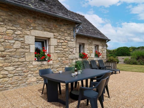 Flower, Sky, Plant, Furniture, Property, Window, Cloud, Table, Building, Chair