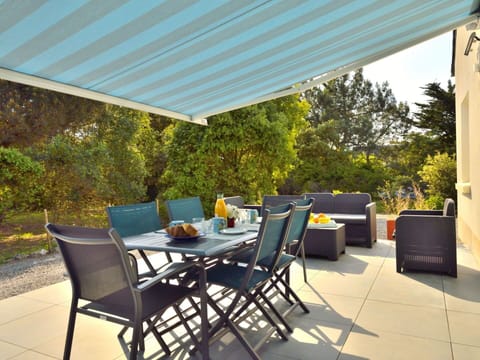 Table, Furniture, Property, Plant, Chair, Shade, Outdoor Furniture, Interior Design, Outdoor Table, Real Estate