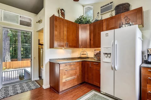 The laundry room and kitchen are just inside the front door.