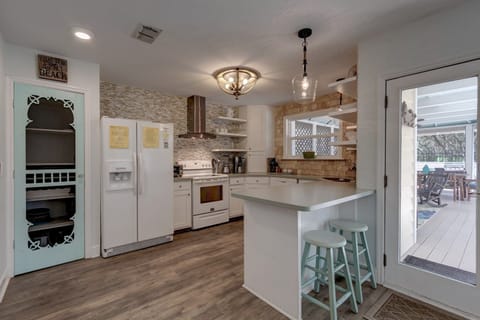 Open Kitchen with Pantry and Quartz Counters