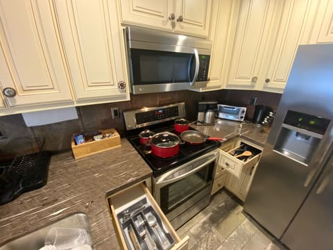 Fully stocked kitchen with free snacks, coffee and drinks