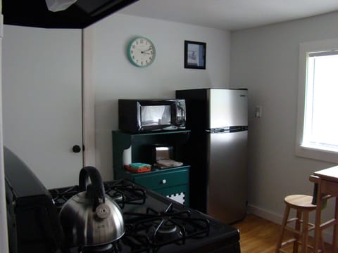Kitchen - Refrigerator, Microwave and Gas stove