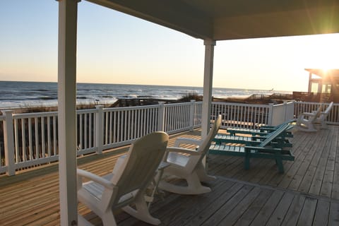 Deck overlooking and just steps from beach and ocean