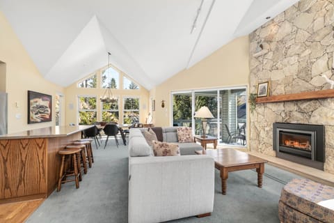 Bright and airy living space with vaulted ceilings and natural light galore.
