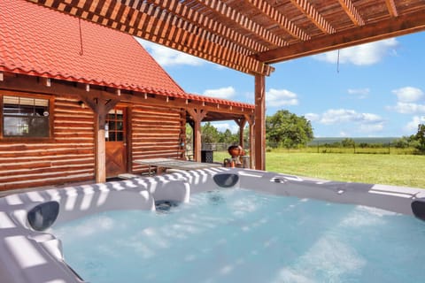 Enjoy a quiet evening in the large hot tub