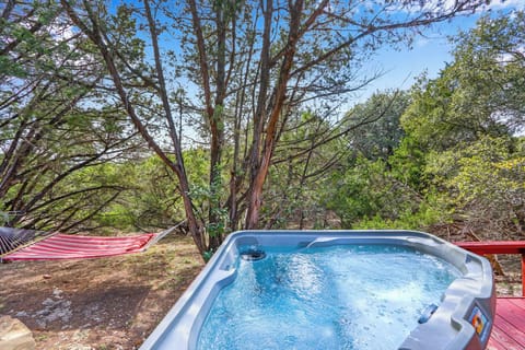Enjoy a relaxing view from the hot tub located on back porch