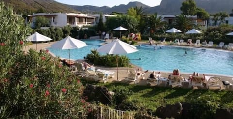 Seasonal outdoor pool, open 10:00 AM to 7:30 PM, sun loungers