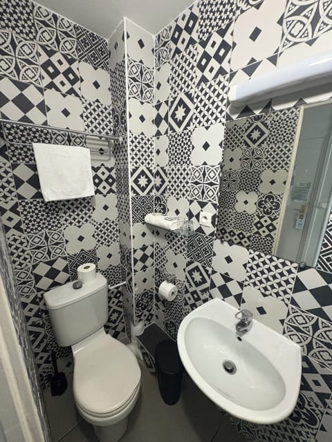 Comfort Twin Room | Bathroom | Shower, hair dryer, towels, soap