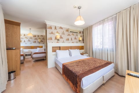 Family Room | Minibar, in-room safe, desk, soundproofing