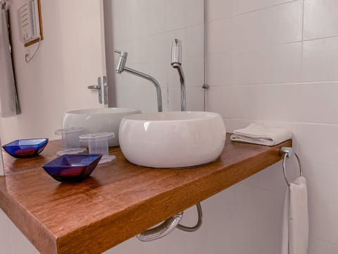 Shower, rainfall showerhead, hair dryer, towels