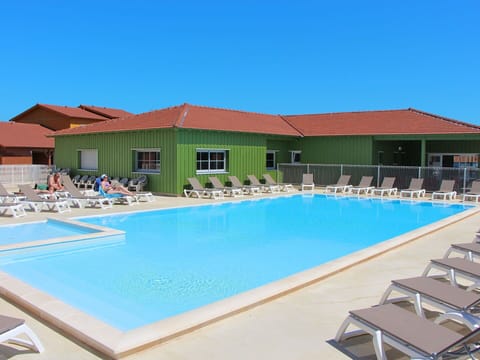 Water, Sky, Building, Property, Swimming Pool, Azure, Shade, Outdoor Furniture, House, Chair