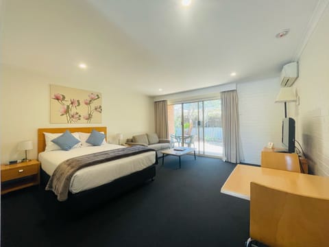 Premium bedding, desk, blackout drapes, iron/ironing board