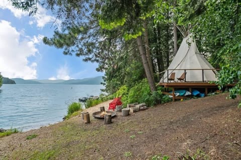 In summer, enjoy the fully appointed teepee with Queen bed