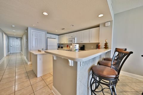 Kitchen with breakfast bar connected