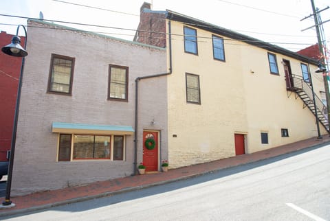 Charming side street with Street Lamps and designated parking space.