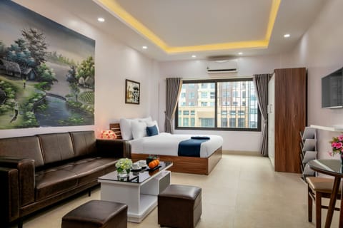 Apartment, 1 Bedroom | In-room safe, desk, laptop workspace, iron/ironing board
