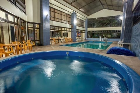 Indoor pool, outdoor pool, open 9:00 AM to 9:30 PM, pool umbrellas