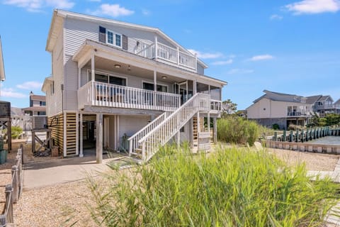 Decks galore on this fabulous home to relax and enjoy the bay breezes.