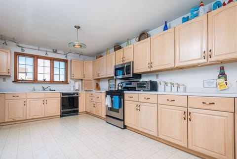 The huge, well-stocked kitchen will delight the Chef in your family.