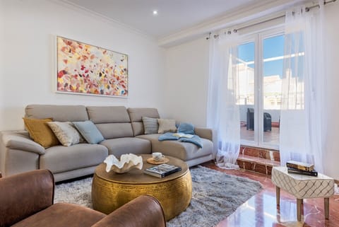 Apartment, 4 Bedrooms | Living area | 32-inch flat-screen TV with cable channels, TV