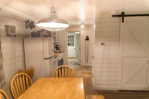 View of cozy Farmhouse kitchen with retro refigerator