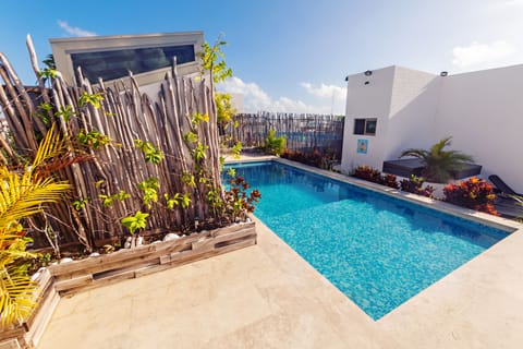Outdoor pool, open 8:00 AM to 8:00 PM, pool umbrellas, sun loungers