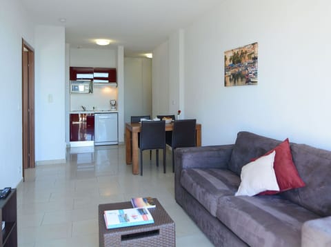 Furniture, Property, Couch, Table, Interior Design, Comfort, Studio Couch, Wood, Floor, Picture Frame