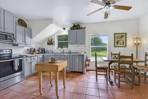 View showing the distance between the dining table and the kitchen.