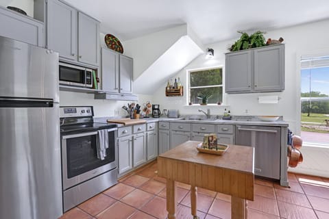 Kitchen with stainless appliances.