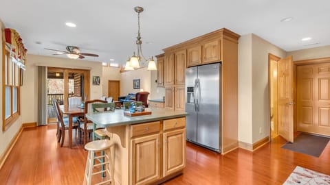 Kitchen with garage and laundry room to the right.  Looking towards deck.