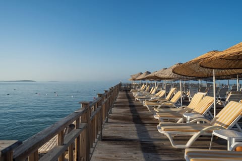 Private beach, sun loungers, beach umbrellas, beach towels