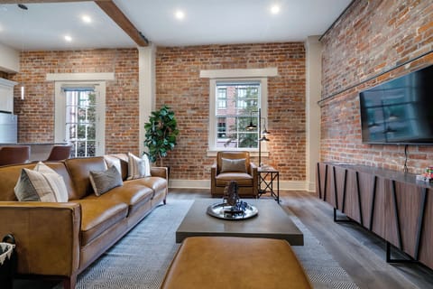 Open concept living and kitchen area with comfortable seating options for you and your guests. 58” Samsung Smart 4K TV that allows for streaming from your favorite apps, along with the DIRECTV Entertainment. All the natural light too!