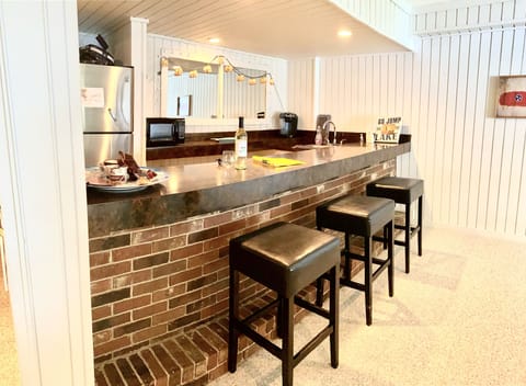 The bar where everyone likes to congregate.