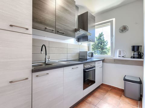 Kitchen, Kitchen Appliance, Countertop, Major Appliance, Cabinetry, Kitchen Sink, Flooring, Wood, Interior Design, Furniture