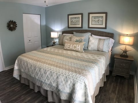 Relax in shades of aqua/sand and memory foam mattress in king master BR